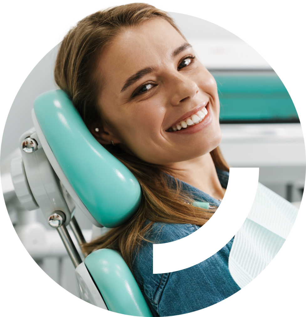 Smiling women in a dentist's office.